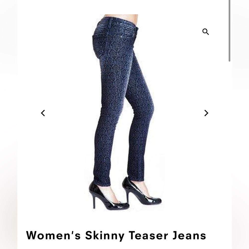 Cult of Individuality teaser jeans with upraised black velvet design